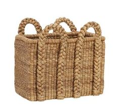 three woven baskets with handles on white background