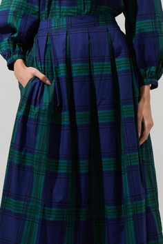 We are getting all the cute fall vibes with the Harrisville Plaid A-Line Maxi Skirt. Features a flattering high waist with pleats all along the front and back. Pockets on each side. Wear it with any boots for a chic ensemble.- Plaid- A-line- Pocket- Maxi- Color: Navy GreenSize + Fit - Model is 10" and wearing size XS- Measurements taken from size S - Waist: 13 1/4"- Length: 40" Fabric Self: 100% Cotton, Lining: 97% Polyester 3% Spandex Style Number STS7087P Plus Size Plaid Skirt, Flowy Maxi Skirts, Tiered Maxi Skirt, Textile Arts, Plaid Skirts, Navy And Green, Fall Vibes, A Line Skirts, Maxi Skirt