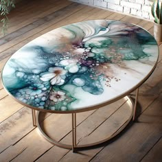 Meet our AI-generated table, a unique resin art piece. Showcasing serene blues, purples, and greens blended flowingly like a watercolor, with subtle floral hints. Framed by timeless rustic charm. #ResinArt #VintageDesign #HomeDecor #WatercolorArt #FloralResinTable #RusticHomeStyle Flower Bird, Living Essentials Oils, Epoxy Resin Art, Acrylic Tray, Diy Resin Art, Resin Table, Art Table, Table Flowers