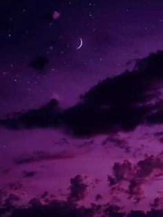 the night sky is purple and full of stars, clouds, and crescents as well as planets