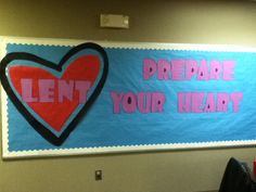 a bulletin board that has been decorated with hearts and the words lent prepare your heart