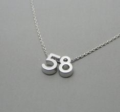 "Silver number necklace, Lucky number necklace, Number jewelry, Number charm,  Personalized jewelry, Custom jewelry Material: Charm: Rhodium plated   Chain:  Rhodium plated  Size: Charm: Approx. 6mm Chain: 16\"  Available with 15\",16\",17\",18\" chain, just leave me a note. For Gold version: https://www.etsy.com/listing/259681060/number-necklace-lucky-number-necklace All necklaces come gift packaged! Personalized notes are welcome :) Please let me know the message you would like to be included Number Jewelry, Silver Numbers, Number Necklace, Lucky Number, Personalized Notes, Plate Size, Gift Packaging, Personalized Jewelry, Rhodium Plated