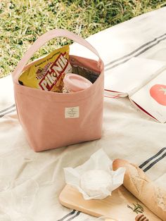 Editor's NotesThis lunch bag has a simple and cute design making it great to bring around any lunch with joy. - Simple yet modern design- Different color options- Great to use dailyMeasurements(in.)ONE SIZE- 7.09 in. x 4.72 in. x 7.48 in. *measurements may vary by ±1.2 in. Composition- Material: 100% CottonDesigner- by LIVEWORK Lunch Box Photography, Lunch Places, School Lunch Bag, Best Lunch Bags, Cooler Tote, Bags For Sale, Cooler Lunch Bag, Stationery Organization, Office Items