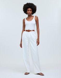 The cut: a fresh take on our best-selling pants, these pleated baggy jeans are fitted through the high waist with wide legs, plus have raw hems.The fabric: loosely woven for a drapey, soft-to-the-touch feel, our premium 100 percent cotton white Cone Airy Denim has no stretch and zero show-through.Perfect white shade.11 3/4" rise, 22" leg opening, 30" inseam.98% cotton/2% spandex.Do Well: By buying cotton products from Madewell, you're supporting our investment in Better Cotton's mission to help Classic Cotton Wide Leg Pants For Summer, Classic Summer Wide Leg Pants With Belt Loops, Classic Wide Leg Pants With Belt Loops For Summer, White Wide Leg Summer Pants With Belt Loops, White Wide Leg Pants With Belt Loops For Summer, Classic Relaxed Fit Wide Leg Pants For Summer, Classic Wide Leg Pants With Relaxed Fit For Summer, Classic High-waisted Wide Leg Summer Pants, Chic High Rise Wide Leg Summer Pants