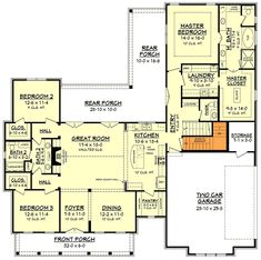 the first floor plan for a home with two master suites and an open concept kitchen