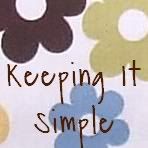 the words keep it simple are written in black ink on a white background with multicolored flowers