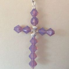 "Cyclamen opal crystal cross necklace, opaque lavender, handmade cross pendant, lady's necklace, cross pendant.  I made this pendant/necklace with 6mm(1/4\") Swarovski  bicone  crystals and silver plate  The cross measures  1-1/4\" x 1-3/4\". The chain is 18\" long.  The cross is available in either gold plate or silver plate." Spiritual Cross Pendant Necklace For Jewelry Making, Spiritual Crucifix Cross Necklace For Jewelry Making, Beaded Cross Pendant Jewelry Gift, Wire Wrapped Cross Pendant Necklace As Gift, Beaded Cross Pendant Necklace As A Gift, Beaded Cross Pendant Jewelry For Gift, Wire Wrapped Cross Pendant Necklace For Gifts, Wire Wrapped Cross Jewelry For Gift, Spiritual Wire Wrapped Cross Pendant Necklace