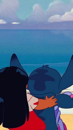 two cartoon characters hugging each other on the beach