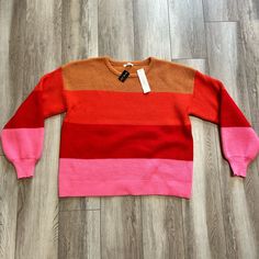 Beige, Pink, Red And Orange Striped Sweater. Oversized Fit. New With Tags From Boutique. Size Small Trendy Red Color Block Sweater, Spring Orange Color Block Sweater, Trendy Red Sweater For Spring, Vibrant Red Tops For Fall, Vibrant Red Top For Fall, Red Knit Color Block Sweater, Red Color Block Sweater For Fall, Trendy Pink Color Block Sweater, Pink Color Block Top For Fall