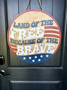 a door sign that says land of the free because of the brave