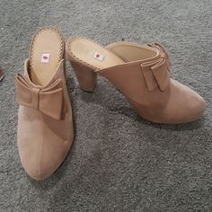 High Heeled Bootie/Clogs/Mules. Worn Once Indoors. There Are A Couple Of Small Indentations In The Heels From Storage. I'm A True Size 8 And These Are A Euro 39 And They Fit Perfect. Approx 3.5 In Heel. Chic Clogs With 4-inch Heel And Round Toe, Beige High Heel Clogs With Stacked Heel, Beige Clogs With Stacked High Heel, Chic Beige Clogs With Round Toe, Chic Beige Round Toe Clogs, Beige Mules With Wooden Heel And Round Toe, Elegant Clogs With 4-inch Heel And Round Toe, Brown Mules With 4-inch Heel And Round Toe, Casual Closed Toe Mules With 4-inch Heel