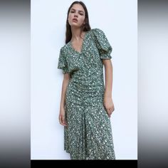 Zara Floral Printed Midi Dress With Drape Detail. Size L. 100% Viscose. Armpit To Armpit 19-20”, Full Waist 29”, Length 49” Elegant Green V-neck Floral Dress, Elegant Printed Green Midi Dress, Elegant Green Printed Midi Dress, Elegant Green Printed Dresses, Zara Green Floral Print Maxi Dress, Green Ruched Short Sleeve Dress, Green Floral Print Midi Dress With Short Sleeves, Green Floral Print Viscose Dress, Green Floral Print Short Sleeve Midi Dress