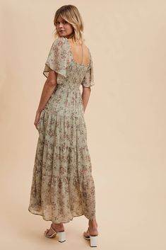 Get ready to turn heads at any wedding with our Isn't It Romantic Floral Dress! With its feminine and sweet design, this dress is the perfect choice for any fall wedding. Don't miss out on the opportunity to be the best-dressed guest! Color: Sage Floral maxi dress Sweetheart neckline Decorative tie front Flutter sleeves Fully lined 100% polyester Isn't It Romantic, Icon Clothing, Wedding Engagement Gifts, Ditsy Floral Print, Fall Candles, Baby & Toddler Clothing, Ditsy Floral, Flutter Sleeves, Floral Maxi