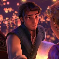 the princess and the frog are looking at each other in this scene from disney's tangled tale