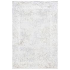 an old white rug with faded edges on the bottom, and a light gray background