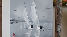 a painting of two sailboats in the water