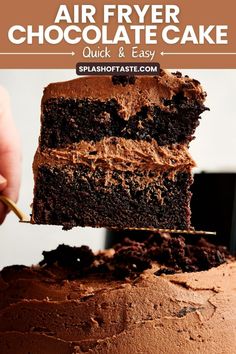 a person is holding a piece of chocolate cake with the words air fryer chocolate cake