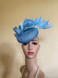 "Light blue pillbox hat. Handmade in light blue sinamay. Trimmed with light blue feathers and sinamay loops. Light and easy to wear. Handmade using traditional millinery skills. Lovely for Weddings,Christenings,Royal Ascot race days and any occasion where you want to look stylish and compliment your outfit. This is a 6 1/2\" diameter pillbox hat and fits to your head with millinery elastic and a comb. \"Evie\"" Blue Fascinator Hats, Blue Wedding Shoes Low Heel, Light Blue Wedding Shoes, Light Blue Wedding Colors, Blue Wedding Nails, Royal Ascot Races, Hats And Fascinators, Blue Fascinator, Wedding Shoes Low Heel