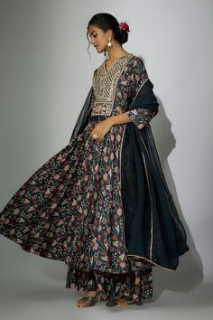 Navy blue anarkali with floral print and zardosi, marodi embroidery. Paired with a gharara and dupatta. - Aza Fashions Navratri Embroidered Maxi Length Sharara, Embroidered Maxi Length Sharara For Navratri, Eid Chanderi Sharara Maxi Length, Embroidered Chanderi Maxi Sharara, Traditional Blue Maxi Length Sharara, Anarkali Sets With Cutdana In Maxi Length, Traditional Embroidered Maxi Palazzo Set, Traditional Embroidered Maxi Length Palazzo Set, Traditional Zari Work Maxi Palazzo Set