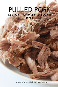 pulled pork made in the crock pot on a white plate with text overlay