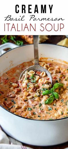 a white bowl filled with pasta and meat soup