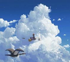 two birds flying in the sky with a man riding on a broom