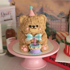 there is a teddy bear cake on the table