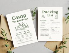 two camp brochures sitting on top of envelopes next to each other with green leaves