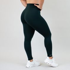 Step into comfort and function with a waistband that curves to your shape. Our Go Go Legging offers full coverage with its high rise, and a curved waistband that forms to your body for less adjusting and more moving. The 25” inseam with a triangle gusset reduces chafing & distractions. The Go Go Legging is perfect for running & training. Solids are forever, and Forest is locked into our core offering. Deep and ultra-rich, Forest will never let you down. Its versatility rivals black & in our clos High Rise Activewear With Wide Waistband, Functional High Rise Elastane Bottoms, Functional Full Length Bottoms With Wide Waistband, High Rise Micro-elastic Bottoms For Gym, High Rise Micro-elastic Gym Bottoms, Micro-elastic High Rise Gym Bottoms, Functional High Rise High Stretch Bottoms, Functional Full-length Tights With Wide Waistband, Compressive High Rise Activewear With Wide Waistband