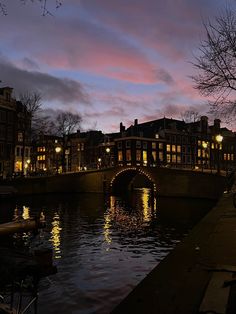 a bridge over a body of water at night