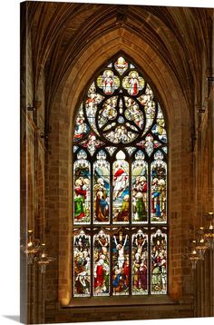 an ornate stained glass window in a church