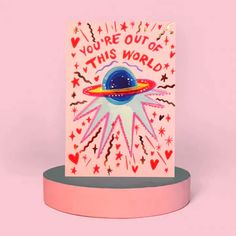 a greeting card with an image of the planet and stars on it that says, you're out of this world