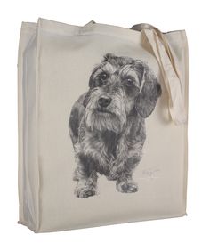 a black and white photo of a dog on a tote bag