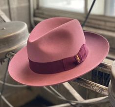 "This European style wide brim fedora features: * 4 1/2\" center dent crown. * 3\" raw edge brim. * Antique Rose Body & Burgundy Ribbon * Finished with a premium roan leather sweatband, a 1 1/2\" ribbon and a satin lining. El Capo is a beautiful, wide-brimmed fedora that is equal parts elegance and style. With roots in European design, the El Capo can be the perfect accessory for a sharp-dressed night out on the town. Additionally, El Capo is available in several different sizes to fit your spec Wide Brim Hat Men, Mens Dress Hats, Burgundy Ribbon, Rose Body, Mens Fedora, Mens Hats Fashion, Throwing Shade, Wide Brim Fedora, Elegant Hats