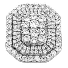 a large diamond ring set in 18k white gold with diamonds on the sides and center