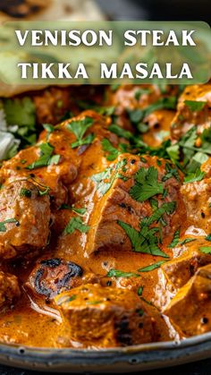 a close up of a plate of food with meat and vegetables in sauce on it