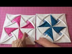 someone is working on some quilts that are being made into small squares and triangles