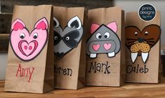 three brown bags with different designs on them