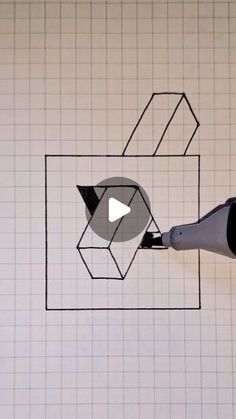 a person using an electric device to draw a square with squares and rectangles