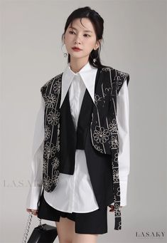 Lasaky - Sleeveless Open Cardigan with Exquisite Jacquard and Embroidery Design Black Floral Embroidery Sleeveless Vest, Embroidered Sleeveless Vest For Fall, Sleeveless Embroidered Vest For Fall, Elegant Embroidered Sleeveless Vest, Winter Floral Embroidered Sleeveless Vest, Sleeveless Spring Outerwear With Floral Embroidery, Sleeveless Outerwear With Floral Embroidery For Spring, Sleeveless Floral Embroidery Spring Outerwear, Sleeveless Floral Embroidered Spring Outerwear