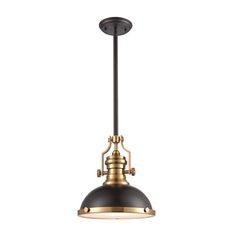 an antique style pendant light fixture with a black and gold finish on the bottom, hanging from