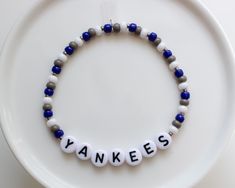 NY Yankees game day bracelets! Your choice between one, two, or all three! - - SIZING - - Every piece is made just for you! Our standard size fits a 6 inch wrist (measures 6.5 inches total length), but can be adjusted upon request. Please leave your desired size in the 'Notes' section upon checkout. Yankees Game, Team Bracelets, Baseball Bracelet, Base Ball, Yankees Baseball, Ny Yankees, Game Day, Sports Team, Arm Band