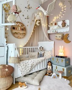 a child's room with lots of toys and decorations on the walls, including a crib