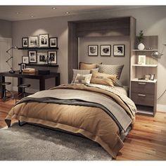 a bedroom with a bed, desk and pictures on the wall