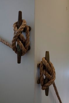 there are two ropes attached to the wall