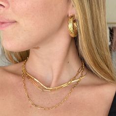 The Hamilton is a 14K gold filled, adjustable, paperclip necklace. This chain is simple and perfect for everyday wear. Wear the chain on its own or add a pendent to make a statement. 3.5mm