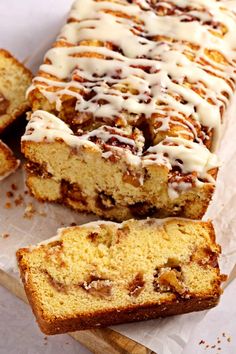 a loaf of cinnamon swirl bread sitting on top of a cutting board