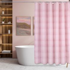 a bathroom with a pink shower curtain next to a white bathtub and wooden shelves