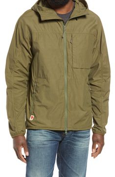 Perfect for day outings and light trekking, this lightweight, packable jacket blocks out cold winds while effectively letting out moisture. Style Name:Fjällräven High Coast Hooded Wind Jacket. Style Number: 6192886.