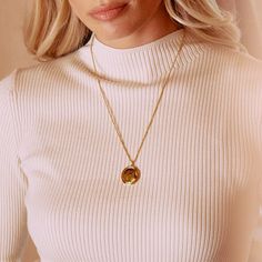 Be the envy of all your friends with the Jeannie Pendant. This charming and personalized accessory is perfect for making a statement. Crafted with 14k gold, you can make it even more unique by having it engraved with your very own message. Put it on, and watch heads turn. Available in 14k gold plated Pendant measures 1" 22"rope chain with 2" extender Lobster claw closure Protected with an anti-tarnish barrier With engraving this item is FINAL SALE SKU: BYN1418 Timeless Stainless Steel Jewelry As Gift, Personalized Gold Jewelry With Polished Finish, Personalized Gift Locket Jewelry, Everyday Gold Jewelry With Locket, Everyday Gold Locket Jewelry, Luxury Jewelry With Engraving Option For Everyday, Luxury Everyday Jewelry With Engraving Option, Elegant Gold Jewelry With Engraving Option, Luxury Engraved Jewelry For Everyday